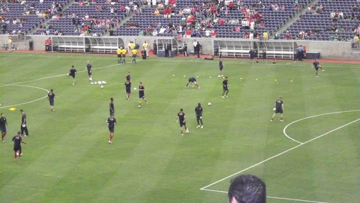 Players warming up on the field before the 2011 Gold Cup semifinal at Reliant Stadium in Houston, view from the stands.
